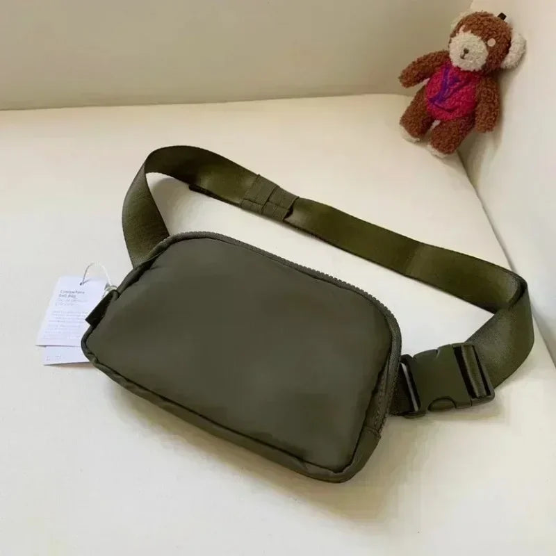 Unisex Fitness Running Waist Bag – Fashionable Sports Bag with Metal Logo, Yoga & Mobile Holder