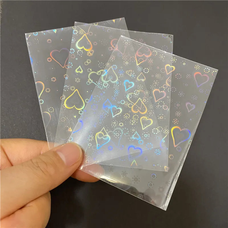 50pcs Heart-Shaped Foil Card Sleeves — 11 Styles, Top-Loading Protector for Pokémon, YGO, Board Games, Photos & K-Pop Cards