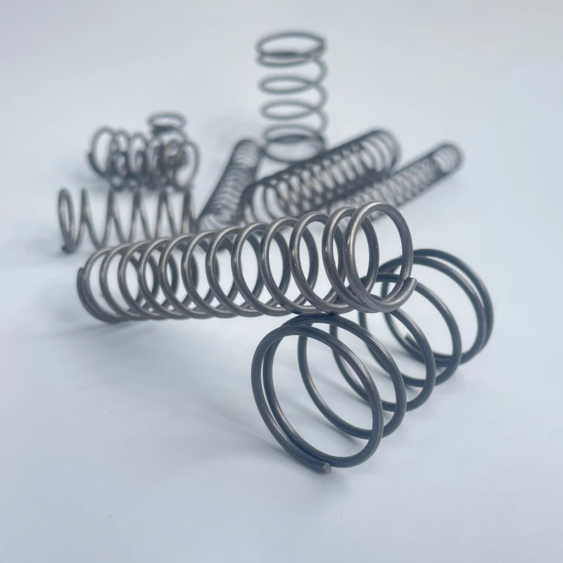 0.5mm/0.6mm/0.7mm Micro Compression Springs – Spring Steel Wire, 4–11mm OD & 5–50mm Length, Customizable