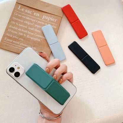 Folding Phone Stand - Self-Adhesive Desktop Sticky Back Phone Holder with Simple Push-Pull Design