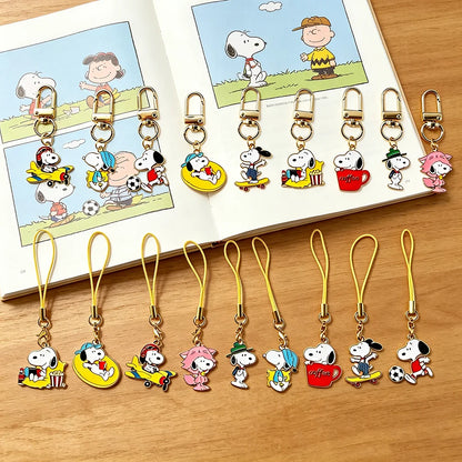 9-Piece Snoopy Cartoon Metal Keychain Set - Cute Kawaii Bag Charms and Backpack Decorations for Gifts and Collectors