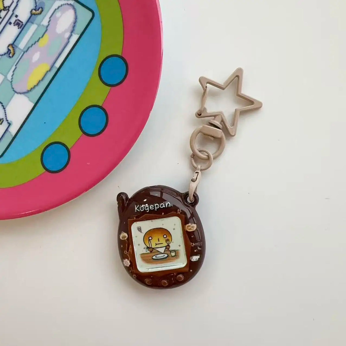 Tamagotchi Mini Cartoon Keychain - Cute Virtual Pet Pendant for Phones, Bags and Gaming Accessories