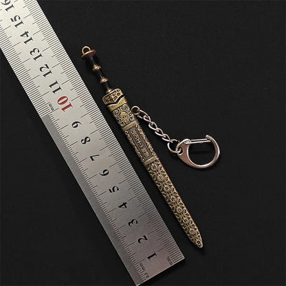 Mini Sword Pendant Keychain – Creative Weapon Toy Key Ring for Backpack & Gifts