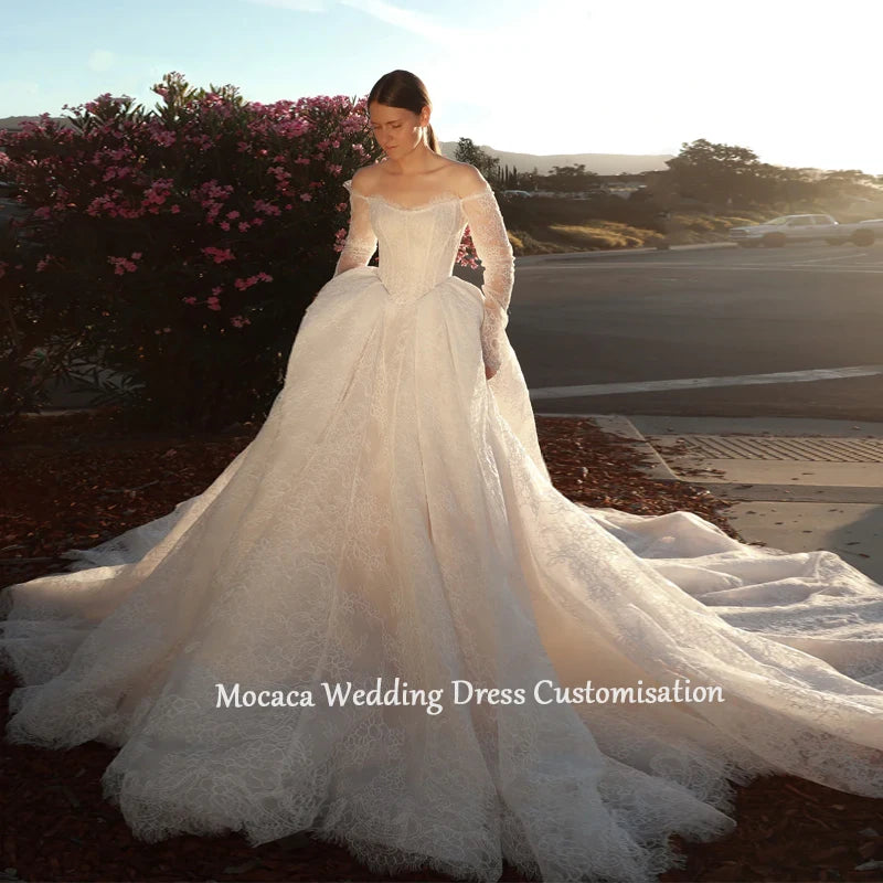 Mocaca 2026 Sweetheart Wedding Dress - Long-Sleeve Princess Gown with Glitter Detail & Court Train