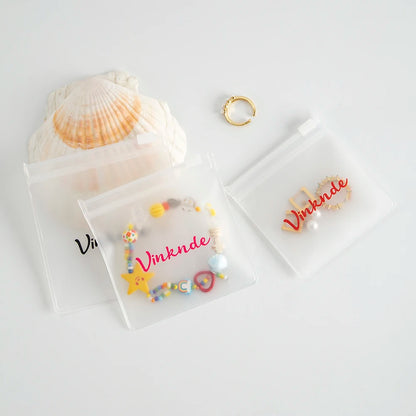 200PCS Bulk Jewelry Zipper Bags — Custom Frosted Transparent PVC Pouches for Necklaces, Earrings & Rings with Logo