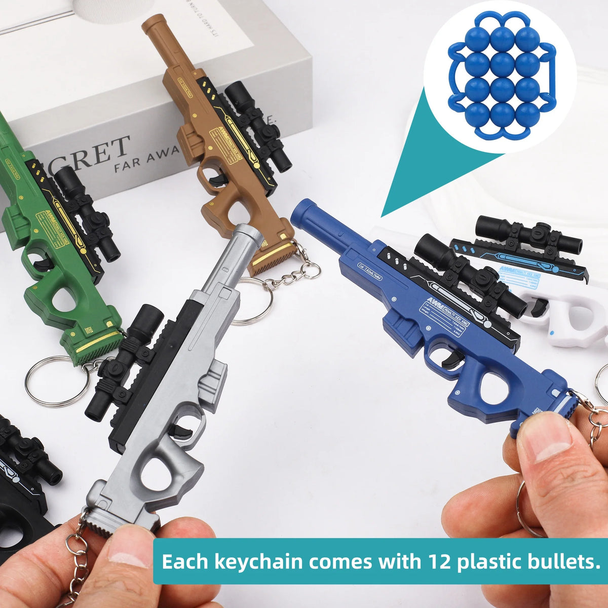 Mini Gun Toy Keychain - Mini Ball-Firing Pendant for Backpacks and Novelty Gifts