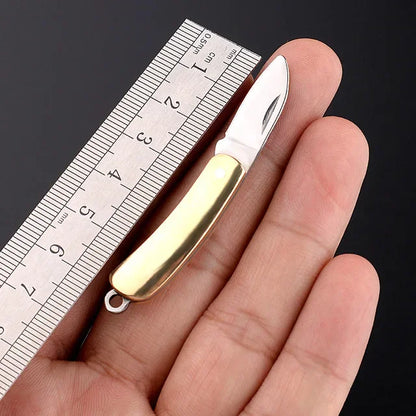 5cm Mini Folding Knife Keychain – Acrylic & Brass Portable Blade Pendant for Camping, Outdoor, and Everyday Carry