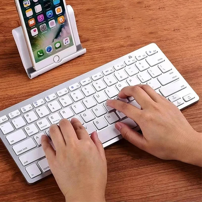 Mini Portable 78-Key Wireless Bluetooth Keyboard for PC, Tablet, iPad & Mobile Phones