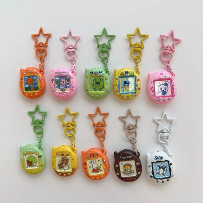 Tamagotchi Mini Cartoon Keychain - Cute Virtual Pet Pendant for Phones, Bags and Gaming Accessories
