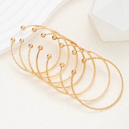 7-Piece Punk Gold Heart Print Bracelet Set for Women – Streetwear Goth Open Metal Bangles Fashion Jewelry Gift 2024