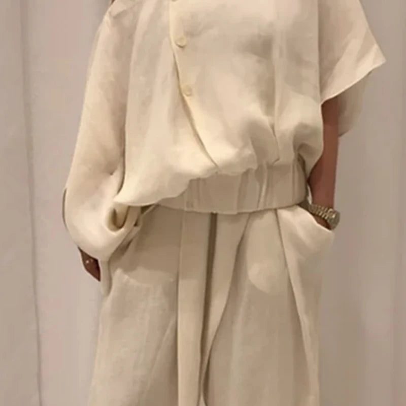 Women’s Fashion 2-Piece Set – Wide-Leg Buttoned Pants & Hollow Solid Color Loose Cold-Shoulder Blouse