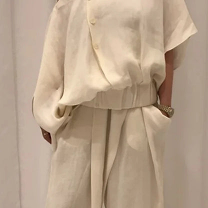 Women’s Fashion 2-Piece Set – Wide-Leg Buttoned Pants & Hollow Solid Color Loose Cold-Shoulder Blouse