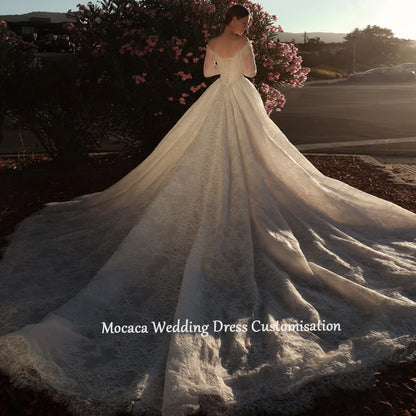 Mocaca 2026 Sweetheart Wedding Dress - Long-Sleeve Princess Gown with Glitter Detail & Court Train