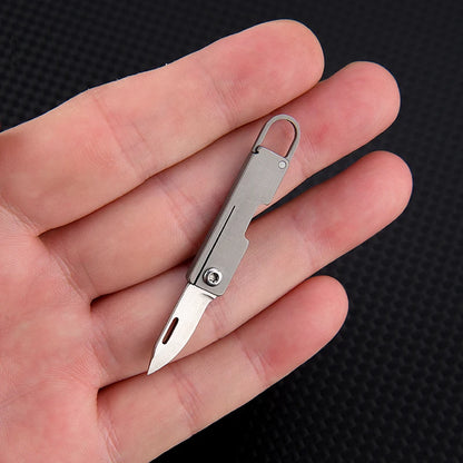 Portable Titanium Alloy Mini Folding Knife Keychain – Sharp Compact Unboxing Tool Pendant