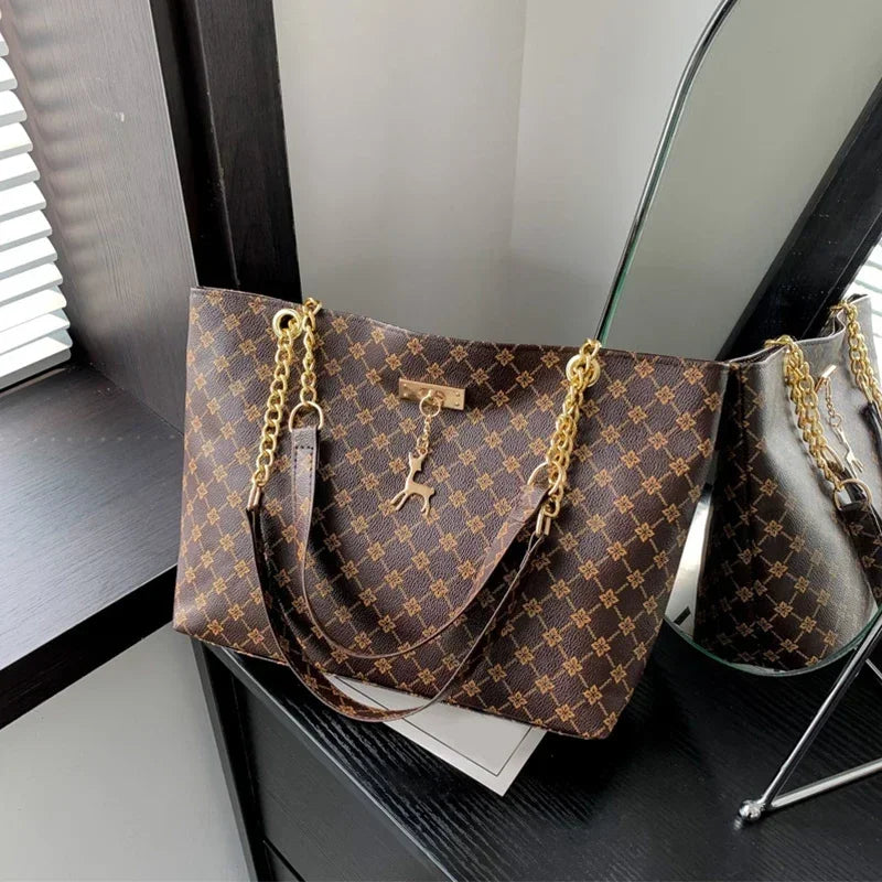 Women’s Large Capacity PU Leather Handbag — Fashion Tote Bag with Textured Design and Hanging Accessories