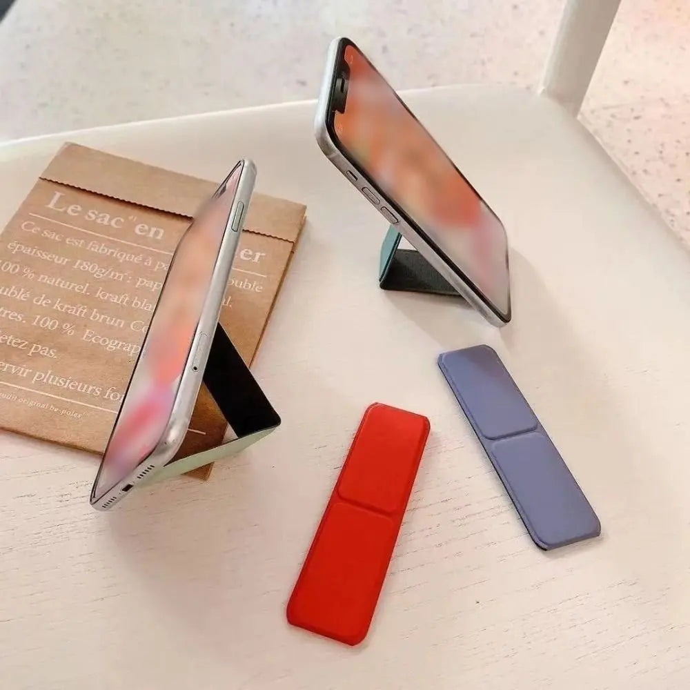 Folding Phone Stand - Self-Adhesive Desktop Sticky Back Phone Holder with Simple Push-Pull Design