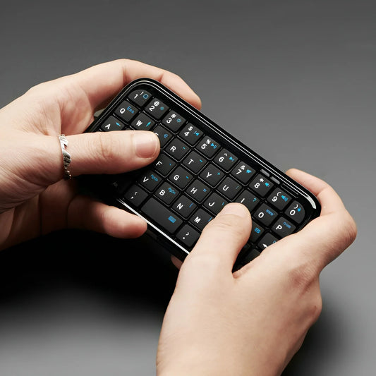 Mini Rechargeable Type-C Bluetooth 3.0 Keyboard – Slim 49-Key Wireless Keypad for Tablets & Smartphones