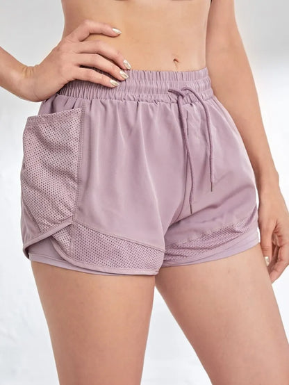 Women’s Elastic Sports Shorts with Pockets – Two-in-One Yoga Leggings for Running & Training