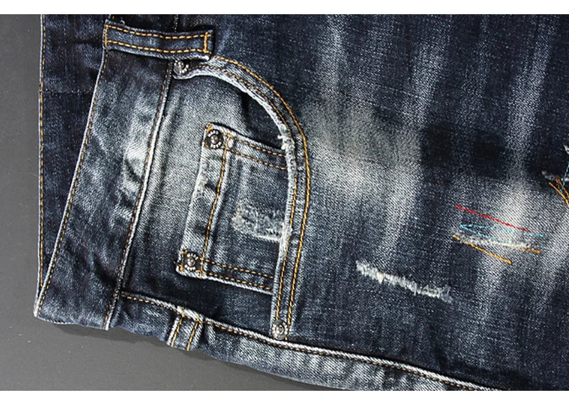 Streetwear Men’s Slim Fit Ripped Jeans – Retro Black & Blue Spliced Denim with Designer Embroidery, Hip Hop Fashion