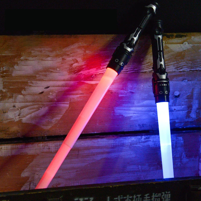 Colorful Glowing Laser Sword Toy – Red & Blue Double Saber with Music & Flashing Lights