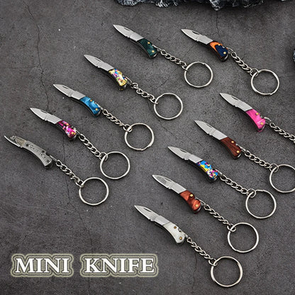 5cm Mini Folding Knife Keychain – Acrylic & Brass Portable Blade Pendant for Camping, Outdoor, and Everyday Carry