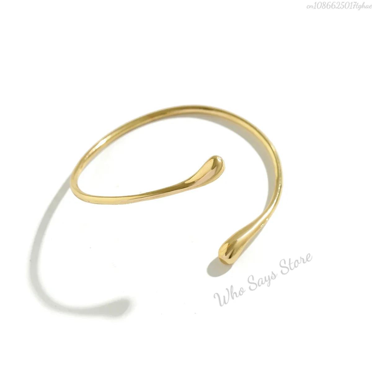 Lacteo Geometric Twisted Upper Arm Cuff Bracelet – Adjustable Water Drop Bangle for Women
