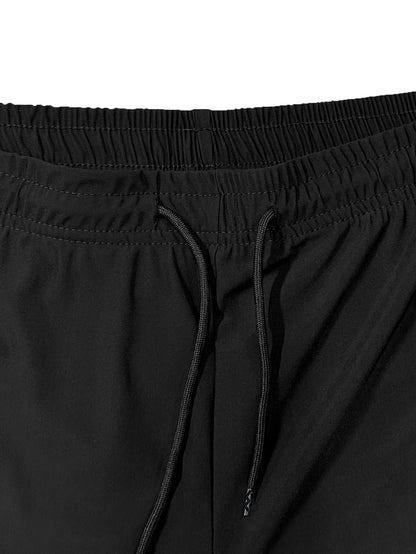 Men’s Solid Color Casual Shorts – Elastic Waist with Drawstring and Zipper Pockets, Loose Fit High Elasticity