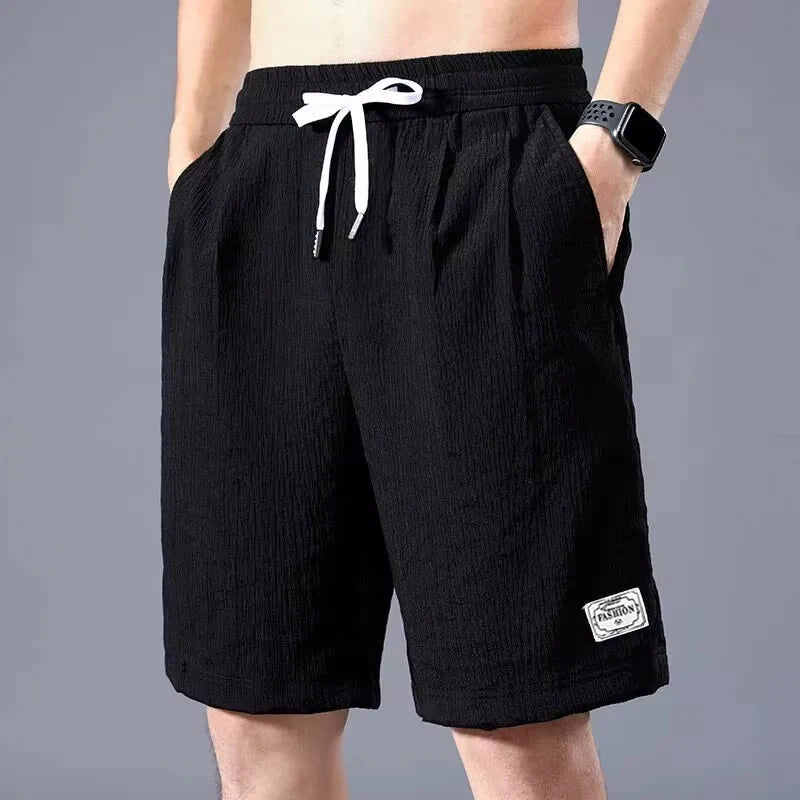 Men’s Ice Silk Sports Shorts – Loose, Breathable Cropped Pants for Casual Wear (XL-XXXL)