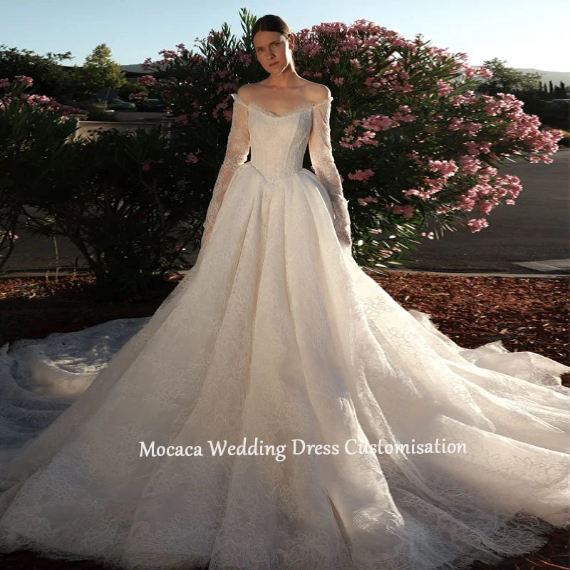 Mocaca 2026 Sweetheart Wedding Dress - Long-Sleeve Princess Gown with Glitter Detail & Court Train