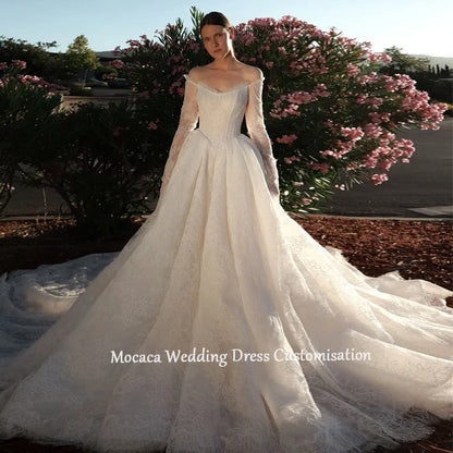 Mocaca 2026 Sweetheart Wedding Dress - Long-Sleeve Princess Gown with Glitter Detail & Court Train