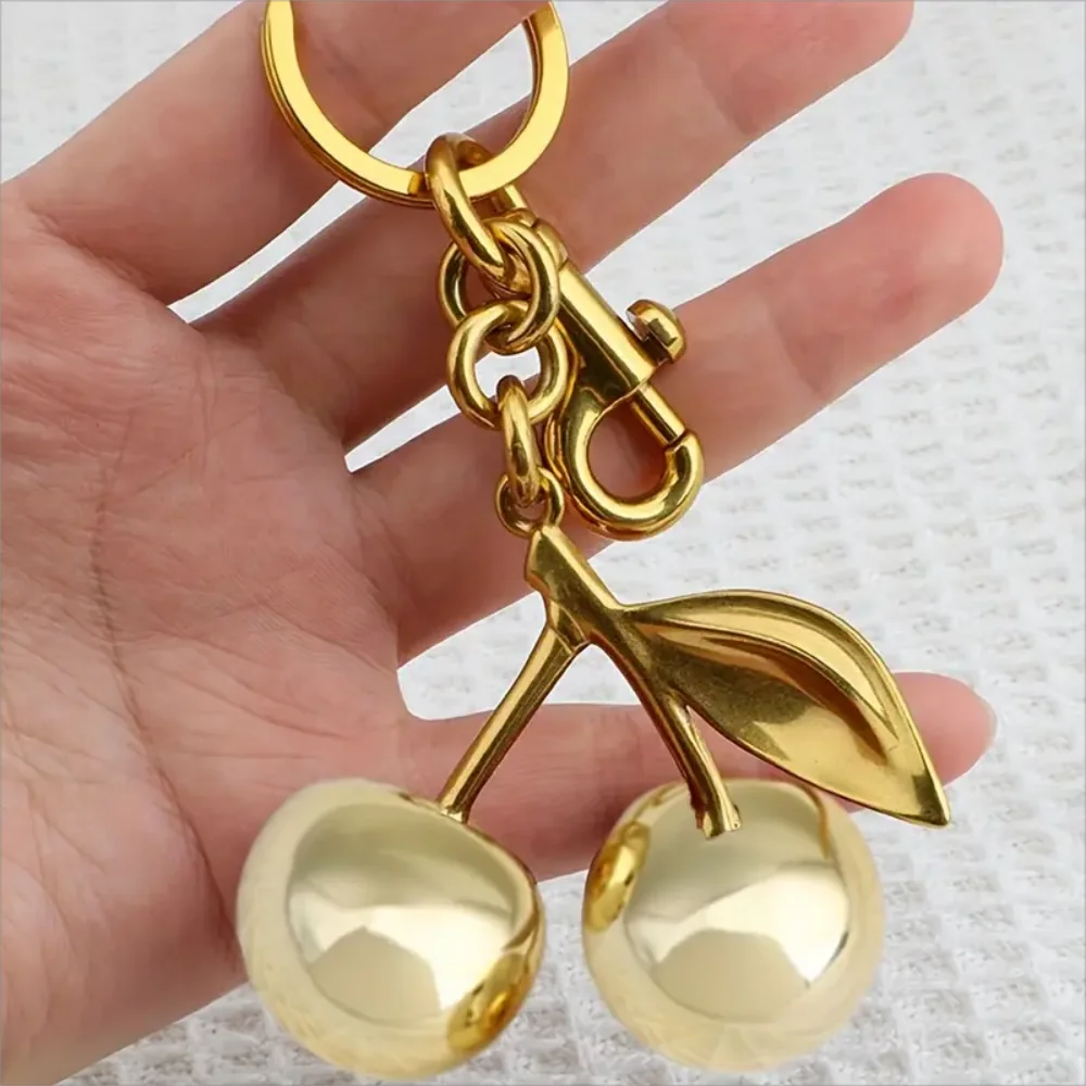 Golden Cherry Keychain Charm — Shiny Resin & Metal Bag Accessory, Elegant Gift for Women