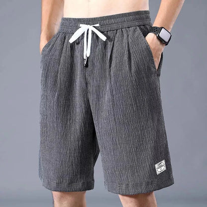 Men’s Ice Silk Sports Shorts – Loose, Breathable Cropped Pants for Casual Wear (XL-XXXL)