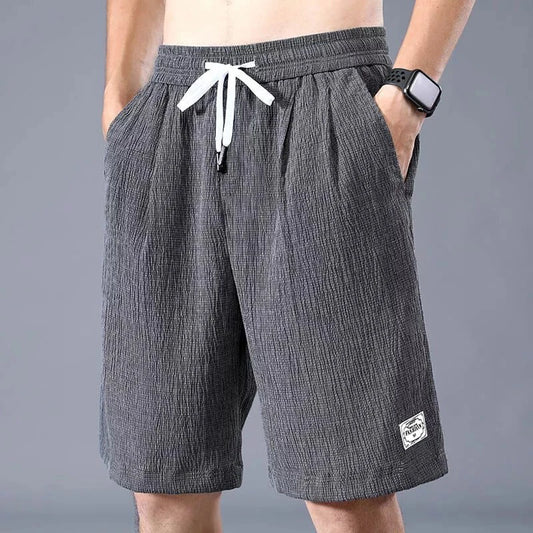 Men’s Ice Silk Sports Shorts – Loose, Breathable Cropped Pants for Casual Wear (XL-XXXL)