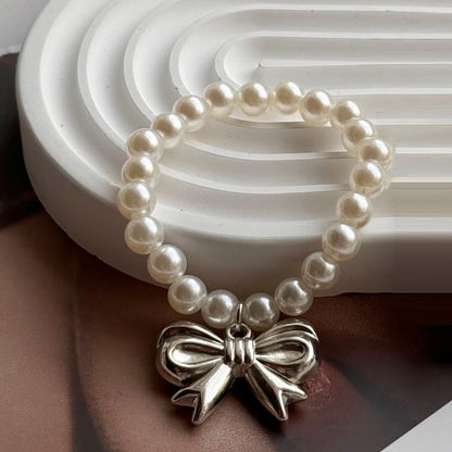 17cm Labubu Macaron Sitting Party Ornament — DIY Cute Plush Pendant with Pearl Necklace & Alloy Chain Accessory