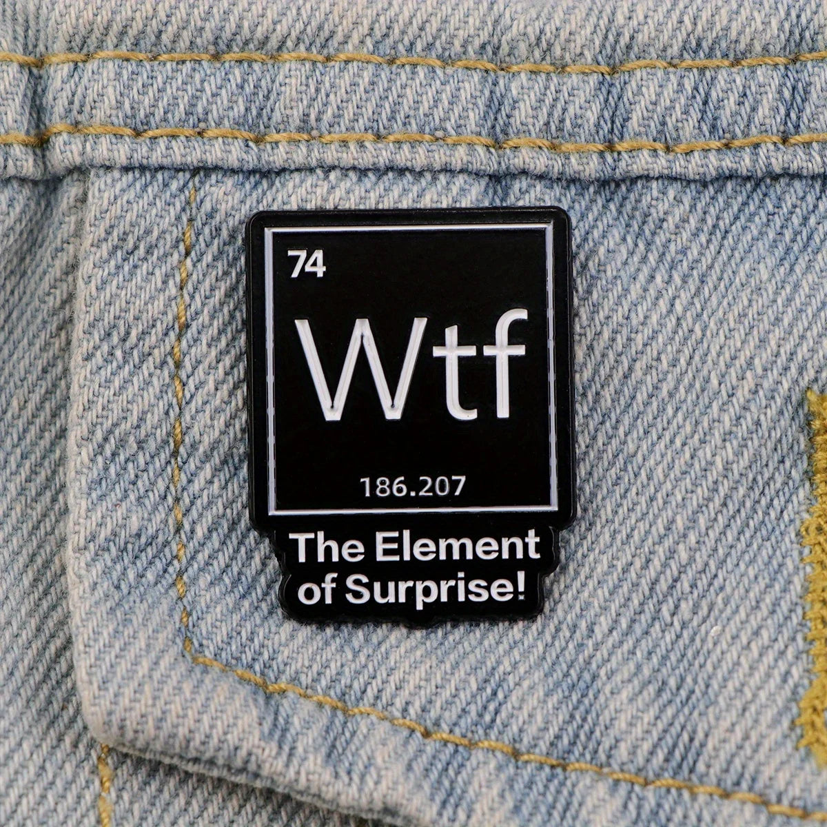 The Element of Surprise Enamel Pin — Black WTF Lapel Pin for Backpacks & Clothing