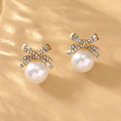 Women’s Silver Bow Earrings with Diamond Pearl – Fashionable High-End Studs