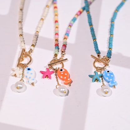 Bohemian Fish & Starfish Pendant Necklace - Sea-Inspired Ceramic Beach Jewelry with Synthetic Turquoise Beads