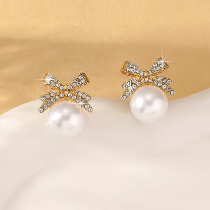 Women’s Silver Bow Earrings with Diamond Pearl – Fashionable High-End Studs