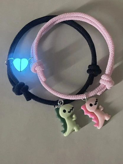 Couple Dinosaur Bracelets – 2-Piece Set, Luminous Peach Heart Pendants, Green and Pink Hand-Woven Bracelets
