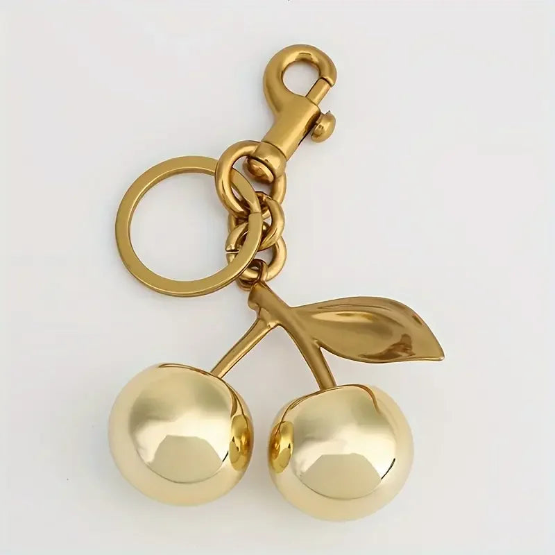 Golden Cherry Keychain Charm — Shiny Resin & Metal Bag Accessory, Elegant Gift for Women