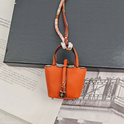Mini Bag Pendant Keychain – Creative Portable Zero Wallet, Bracelet, and Bluetooth Earphone Multifunctional Hanging Accessory