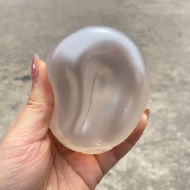 Moldable Pearl Coconut Oil Squishy Toy - Slow-Rising Sensory Stress Relief Ball