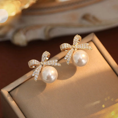 Women’s Silver Bow Earrings with Diamond Pearl – Fashionable High-End Studs