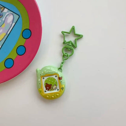 Tamagotchi Mini Cartoon Keychain - Cute Virtual Pet Pendant for Phones, Bags and Gaming Accessories