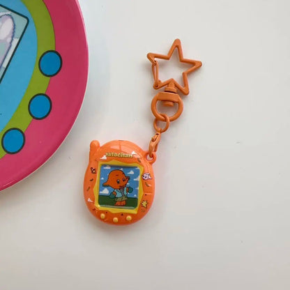 Tamagotchi Mini Cartoon Keychain - Cute Virtual Pet Pendant for Phones, Bags and Gaming Accessories