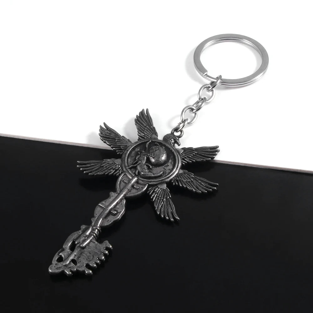 Six-Winged Unborn Metal Keychain - Game Village Inspired Alloy Pendant Keyring & Collectible Gift