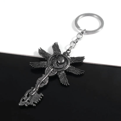 Six-Winged Unborn Metal Keychain - Game Village Inspired Alloy Pendant Keyring & Collectible Gift