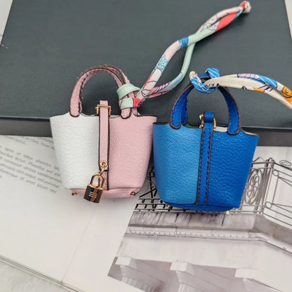 Mini Bag Pendant Keychain – Creative Portable Zero Wallet, Bracelet, and Bluetooth Earphone Multifunctional Hanging Accessory