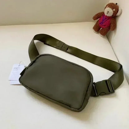 Unisex Fitness Running Waist Bag – Fashionable Sports Bag with Metal Logo, Yoga & Mobile Holder