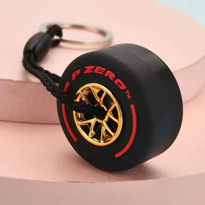 Mini F1 Racing Tire Keychain – Luxury Car Key Accessory & PVC Tire Pendant for Men, Car Lovers & Gifts
